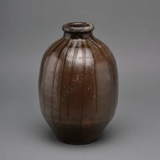 A Japanese Bizen stoneware storage jar (tsubo),